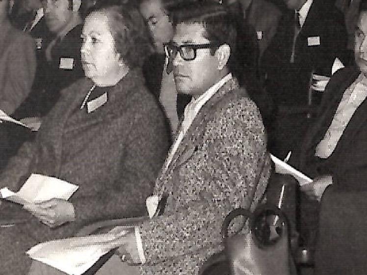 Fotografía de personas sentadas en un curso.