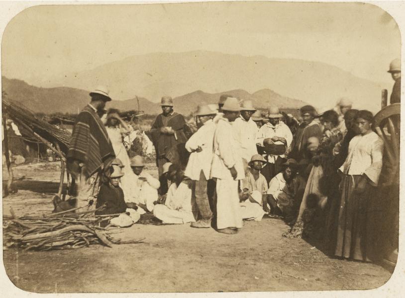 Campesinos jugando cartas.