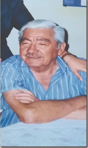 Héctor Torres Jordán (1928 - 2011) Fotografía de retrato de un hombre.